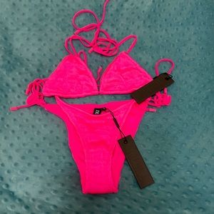 Bright pink “Vinca-Mysa” swimsuit from triangl. XSmall